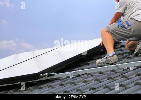 Assembly of a photovoltaic system Stock Photo