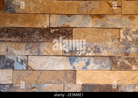 Masonry with natural stone cladding Stock Photo