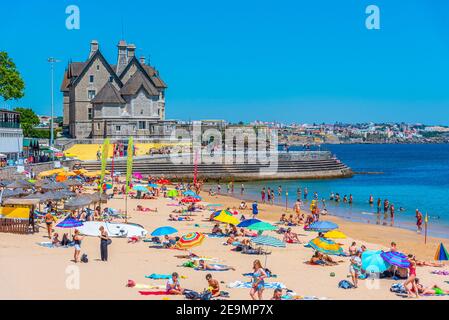 CASCAIS, PORTUGAL, MAY 31, 2019: Palace of duques of palmela viewed behind Duquesa beach in Cascais, Portugal Stock Photo