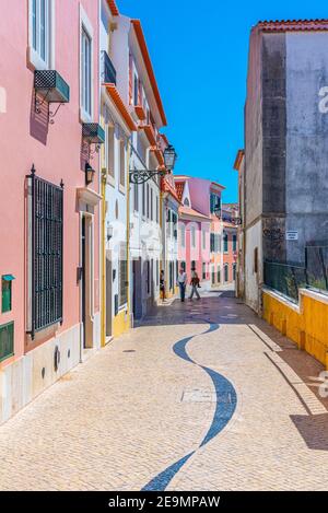 CASCAIS, PORTUGAL, MAY 31, 2019: People are strolling through narrow streets of Cascais in Portugal Stock Photo