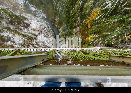 View down from High Steel Bridge, once a logging railroad bridge and now a road bridge crossing the South Fork Skokomish River, Olympic National Fores Stock Photo