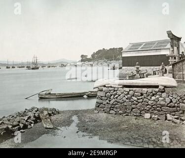 Late 19th century photograph - boat and ships on water, Nagasaki, Japan Stock Photo