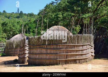 Round huts surrounded by kraals and byres for cattle and goats, reed fences in a  living museum of Swazi lifestyle during 1850's,Mantenga,Eswatini Stock Photo