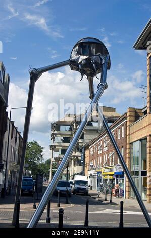 WOKING, SURREY, ENGLAND - AUGUST 14: Sculpture of a Martian invader in the town centre on August 14 2012. Sculpted by Michael Condron to commemorate l Stock Photo