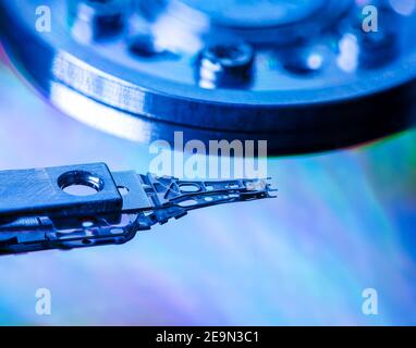 Macro of an open computer hard drive with the read/write head Stock Photo