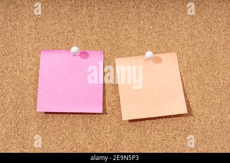 Two Blank note on a cork board for adding text and push pin. Mock up Stock Photo