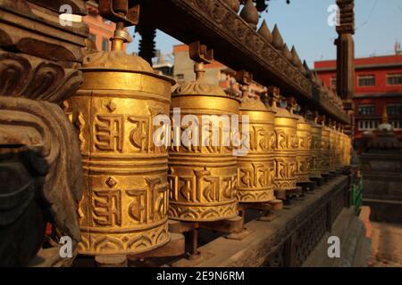 Buddhistic hand Prayer Wheels in Kathmandu near Boudhanath Stupa, Nepal, Asia Stock Photo