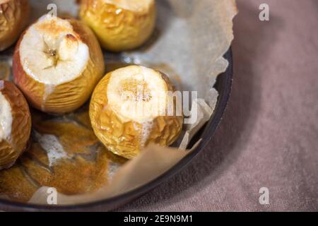 ripe sweet apples baked with honey in the oven Stock Photo