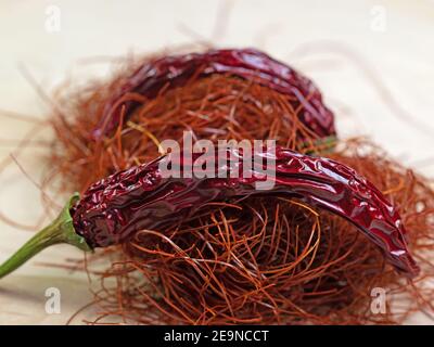 Chilli threads and chilli pod in a close-up Stock Photo