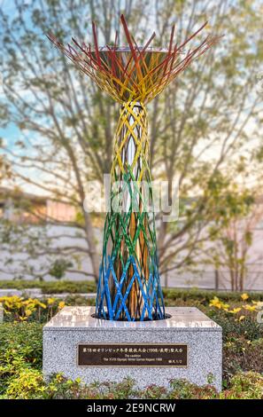 tokyo, japan - january 15 2020: Half size replica of Nagano Olympic Cauldron designed with criss crossed metal twigs in 1998 for the Nagano Olympic Wi Stock Photo