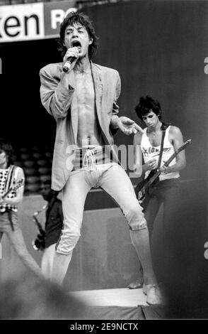 ROTTERDAM, THE NETHERLANDS - JUN 02, 1982:  Singer Mick Jagger of The Rolling Stones during their concert in de kuip stadium in Rotterdam. The Rolling Stock Photo
