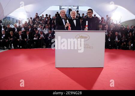 Directors Luc Dardenne (R) and Jean-Pierre Dardenne, winners of the The Grand Prix award for 'The Kind With A Bike' and Turkish Director Nuri Bilge winner of The Grand Prix Ex-aequo award for the film 'Bir Zamanlar Anadolu'da' (Once Upon a Time in Anatolia) pose during the Winners Photocall of the 64th Cannes International Film Festival, at the Palais des Festivals in Cannes, southern France on May 22, 2011. Photo by Hahn-Nebinger-Genin/ABACAPRESS.COM Stock Photo