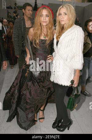 US actresses Mary-Kate (L) and Ashley Olsen pose prior to the presentation of the Christian Dior Spring-Summer 2007 Ready-to-Wear collection by British designer John Galliano, in the Grand Palais in Paris, France on October 3, 2006. Photo by Khayat-Nebinger-Orban-Taamallah/ABACAPRESS.COM Stock Photo