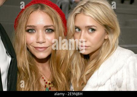 US actresses Mary-Kate (L) and Ashley Olsen sit front row at the presentation of the Christian Dior Spring-Summer 2007 Ready-to-Wear collection by British designer John Galliano, in the Grand Palais in Paris, France on October 3, 2006. Photo by Khayat-Nebinger-Orban-Taamallah/ABACAPRESS.COM Stock Photo