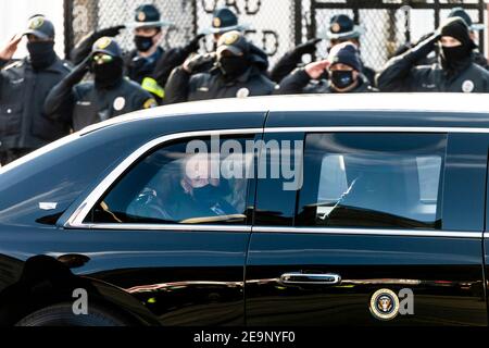 U.S President Joe Biden looks out the window from the presidential limousine during the Inauguration Day parade January 20, 2021 in Washington, DC. Stock Photo