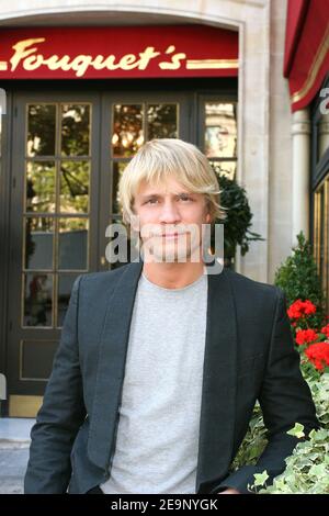 Belgian actor Jeremie Renier, winner of Cinema award 'Jean Gabin' prize poses in front of Le Fouquet restaurant in Paris, France, few hours before the ceremony on October 16, 2006. Photo by Benoit Pinguet/ABACAPRESS.COM Stock Photo