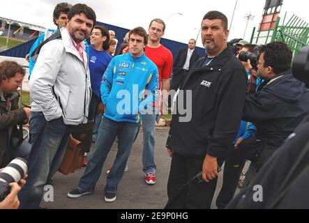 Spain's Formula One driver Fernando Alonso of Renault F1 team walks through the paddock at the racetrack in Interlagos near Sao Paulo Brazil on October 19, 2006. The F1 Grand Prix of Brazil will take place on Sunday 22 October. Photo by Christophe Guibbaud/Cameleon/ABACAPRESS.COM Stock Photo