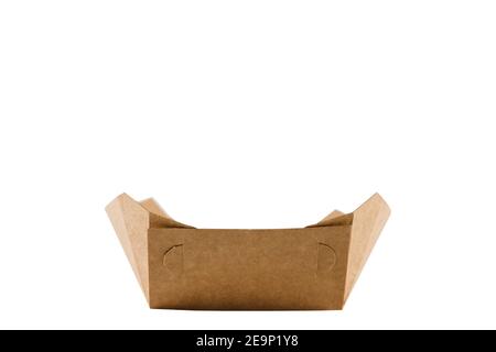 Eco natural plate for food with empty space. Disposable ecological utensils on white background. Sustainability of planet. Cardboard plate made of fib Stock Photo