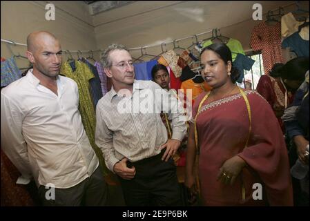 French footballer Zinedine Zidane and Danone CEO Franck Riboud near Dhaka, Bangladesh on November 7, 2006. Zidane played with young Bangladeshi soccer players during his brief visit to the south Asian Nation. Photo by Patrick Durand/Cameleon/ABACAPRESS.COM Stock Photo