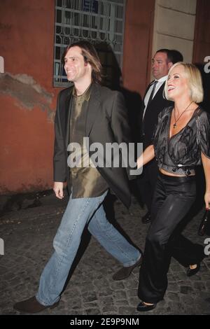 Jim Carrey and his girlfriend Jenny McCarthy arrive at Tom Cruise and Katie Holmes' pre-wedding party at restaurant 'NINO' in Rome, Italy on November 16, 2006. Photo by ABACAPRESS.COM Stock Photo