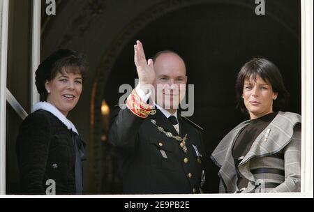 Prince Albert II of Monaco, flanked by his two sisters princesses Stephanie of Monaco and Caroline of Hanover attend, from the Palace's balcony, the standard release ceremony and military parade on palace square in Monaco as part of National's day ceremonies on Nov. 19, 2006. Photo by Nebinger-Orban/ABACAPRESS.COM Stock Photo