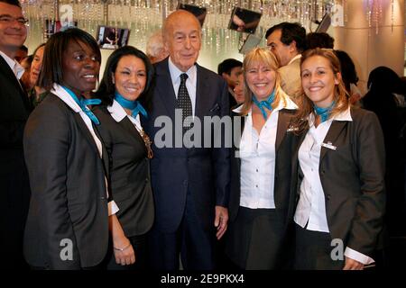 Former French president Valery Giscard d'Estaing (c), attends the Club Med store opening party on the Champs Elysees, in Paris, France, on December 13, 2006. Photo by Thierry Orban/ABACAPRESS.COM Stock Photo