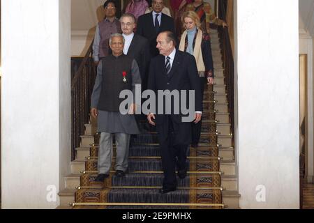 Micro-credit pioneer and Nobel Peace Prize laureate Muhammad Yunus and French President Jacques Chirac leaves after their talk at the Elysee in Paris, France on December 16, 2006. Photo by Bernard Bisson/ABACAPRESS.COM Stock Photo