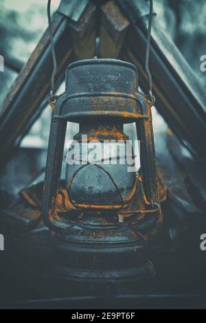 A very old metal mining oil lamp Stock Photo
