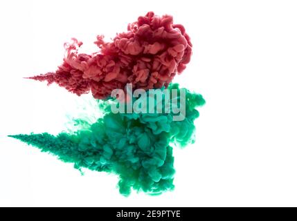 colored abstract liquid clouds formed by pressurized paint injections Stock Photo