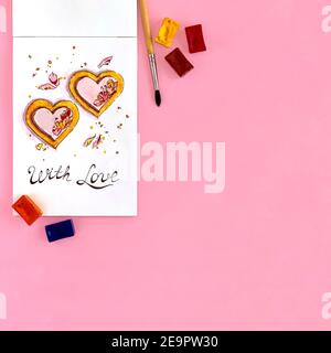 Watercolor sketch: heart shaped cakes, flower petals, text With love Stock Photo