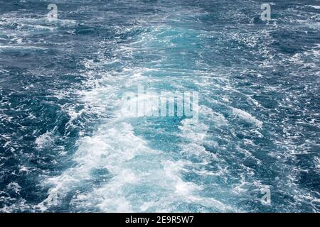 Boat Wave ocean trace on blue sea fresh water background. Traveling destinations Red Sea Seashore Egypt. Stock Photo