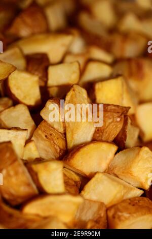 Cutting potatoes in small pieces close up catering background modern high quality prints Stock Photo