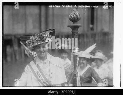 Mrs. Van Winkle and Suffrage torch Stock Photo