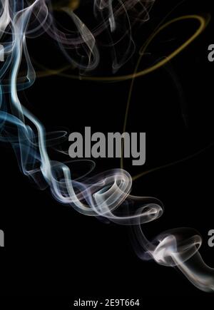 Pink and blue smoke curves on black isolated background Stock Photo