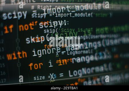 SEO optimization. Modern tech. PHP syntax highlighted. Writing programming functions on laptop. Big data and Internet of things trend. Stock Photo