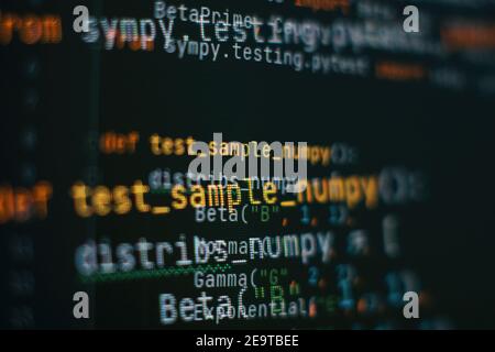 Abstract computer script code. Programming code screen of software developer. Software Programming Work Time. Code text written and created entirely b Stock Photo