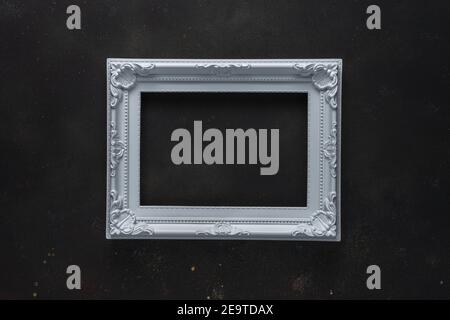 Creative layout with white frame on black background. Minimal abstract pattern. Copy space. Stock Photo