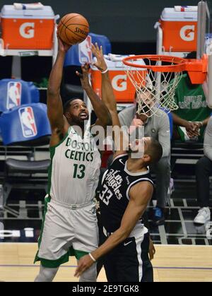 Boston Celtics' power forward Tristan Thompson scores over Los Angeles Clippers' power forward Nicolas Batum during the fourth quarter at Staples Center in Los Angeles on Friday, February 5, 2021. The Celtics defeated the Clippers 119-115.  Photo by Jim Ruymen/UPI Stock Photo