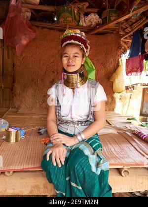 Portrait of a beautiful woman from the Long Neck or Karen hill tribe wearing their signature necklace Stock Photo