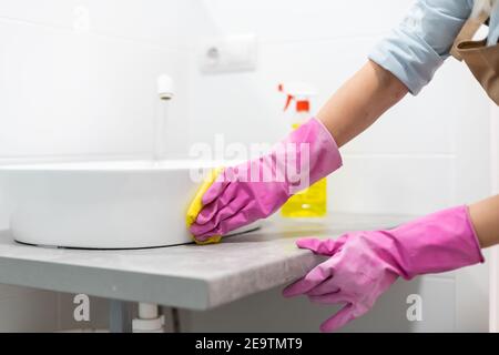Clean up your house, woman cleaning the bathroom Stock Photo