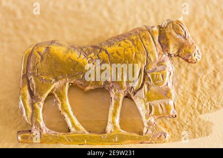 Egypt, Cairo, Egyptian Museum, gold amulet found  in a tomb of Nag el Deir,  first Dynasty : A cow. Stock Photo