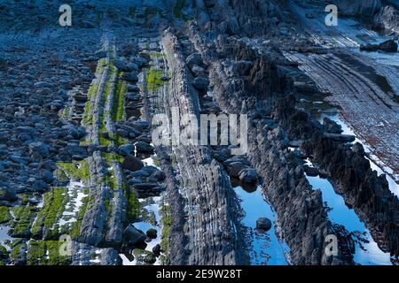 Flysch in La Arnia. Cliffs of Liencres. Municipality of Piélagos in the Autonomous Community of Cantabria, Spain, Europe Stock Photo