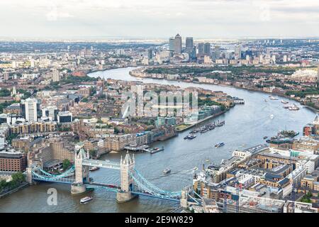 LONDON, UK - July 03, 2013. London Tower Bridge and Canary Wharf (Docklands). Aerial view of the River Thames, Central London Stock Photo