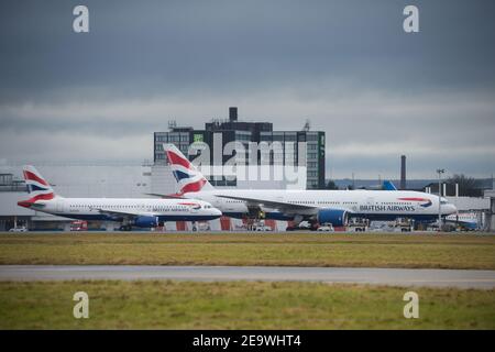 Glasgow, Scotland, UK. 6th Feb, 2021. Pictured: A special cargo flight: a British Airways Boeing 777-236ER (reg G-YMMS) which arrived from Bangkok Flt no BA3580 last night carrying supplies of PPE into Glasgow, and is now being loaded back up with more cargo before departing for London Heathrow. A rare sight at Glasgow Airport but especially during the coronavirus (COVID19) pandemic where passenger numbers have fallen dramatically and a number of airlines have either gone bust or are taking a brief hiatus in order to save cash. Credit: Colin Fisher/Alamy Live News Stock Photo