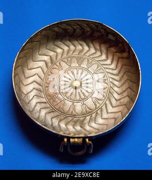 Egypt, Cairo, Egyptian Museum, dishes found in the royal necropolis of Tanis, burial of Wendjebauendjed : silver dish with flowers and buds. Stock Photo