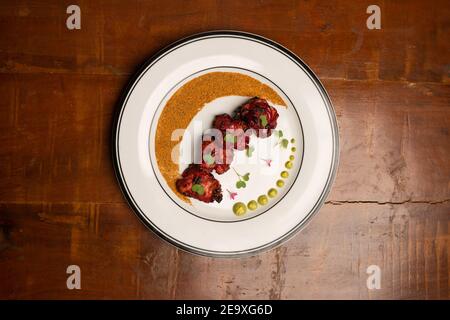 Chicken skew Kebab.Traditional Indian dish cooked on charcoal and flame.top down photo Stock Photo