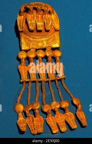 Egypt, Cairo, Egyptian Museum, gold earrings of Ramses XI, found in Abydos, Kom el Sultan.  With snakes wearing sun disks and Atef crowns. Stock Photo