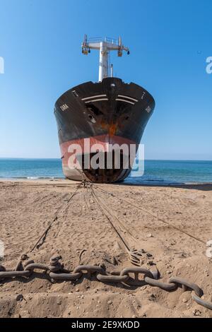 Ship being broken up at Gadani ship-breaking yard, located across a 10 km long beachfront, Balochistan, Pakistan. Stock Photo