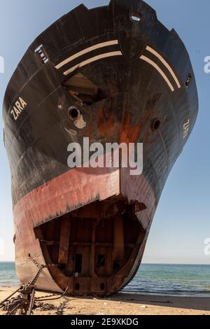 Ship being broken up at Gadani ship-breaking yard, located across a 10 km long beachfront, Balochistan, Pakistan. Stock Photo