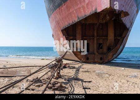 Ship being broken up at Gadani ship-breaking yard, located across a 10 km long beachfront, Balochistan, Pakistan. Stock Photo
